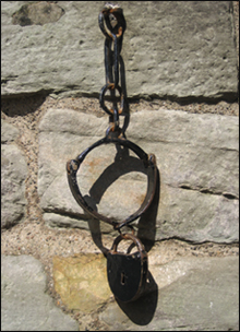 Jougs attached to Abernethy Round Tower